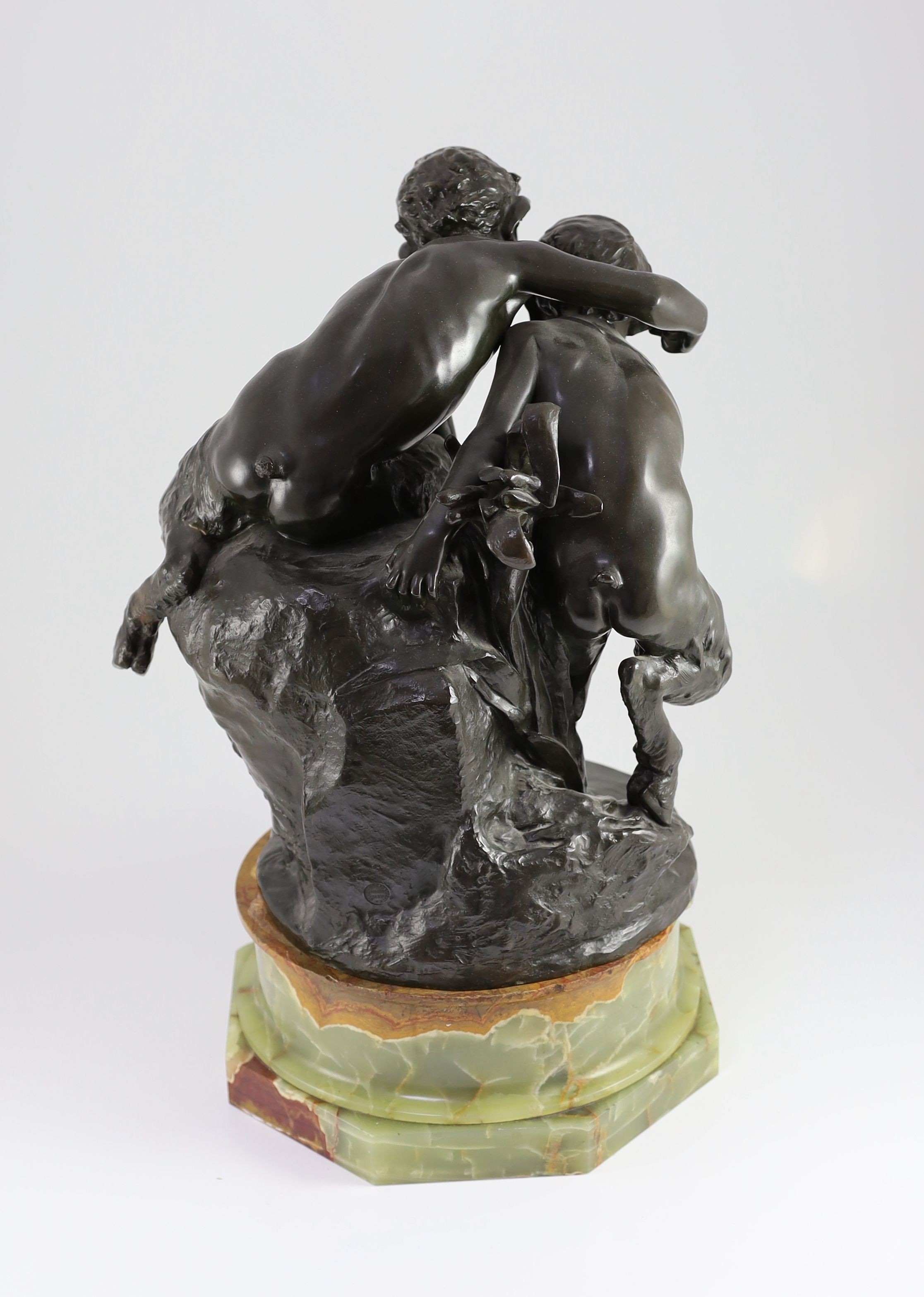 Raoul Larche (1860-1912). A bronze group of two fauns upon a riverbank looking at their reflection, height 57cm